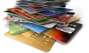 A stack of credit cards to reduce debt