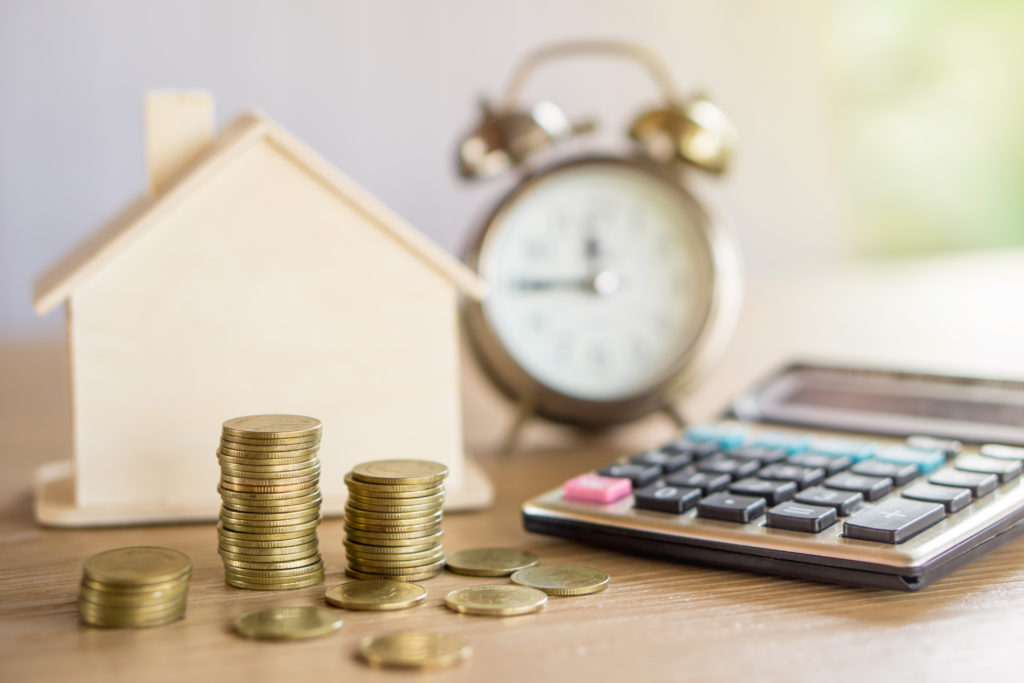 Coins, a calculator and an alarm clock